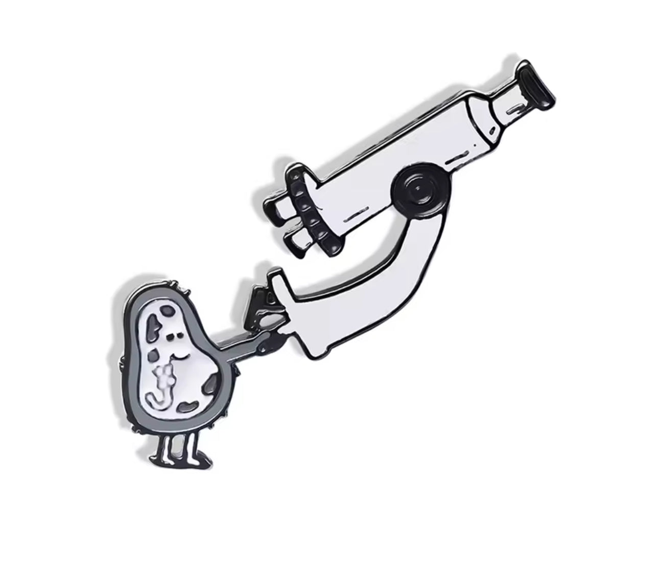 Black and white enamel pin of a microscope observing a smiling cartoon germ cell.