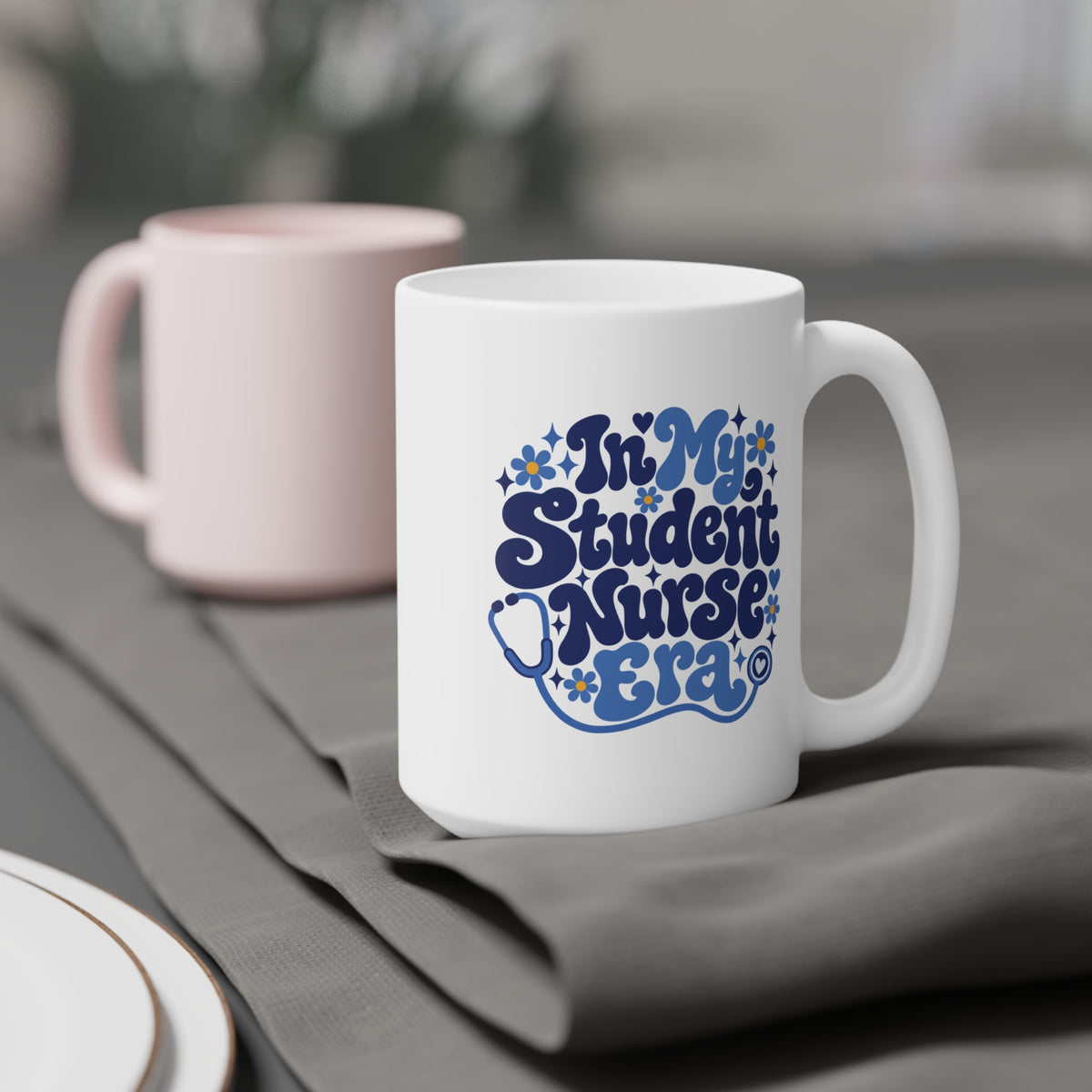 In My Student Nurse Era Mug, Blue Floral, 15 oz, styled supplier scene with centred artwork