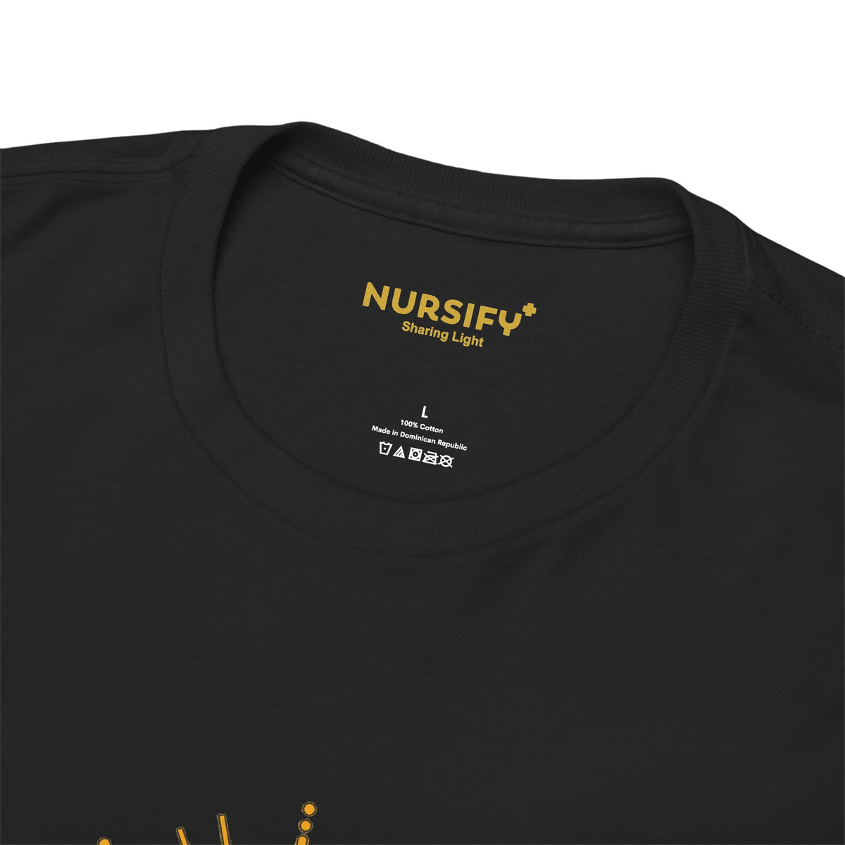 Close view of the black T shirt collar with the gold Nursify logo and Sharing Light inside neck print above the garment care information.