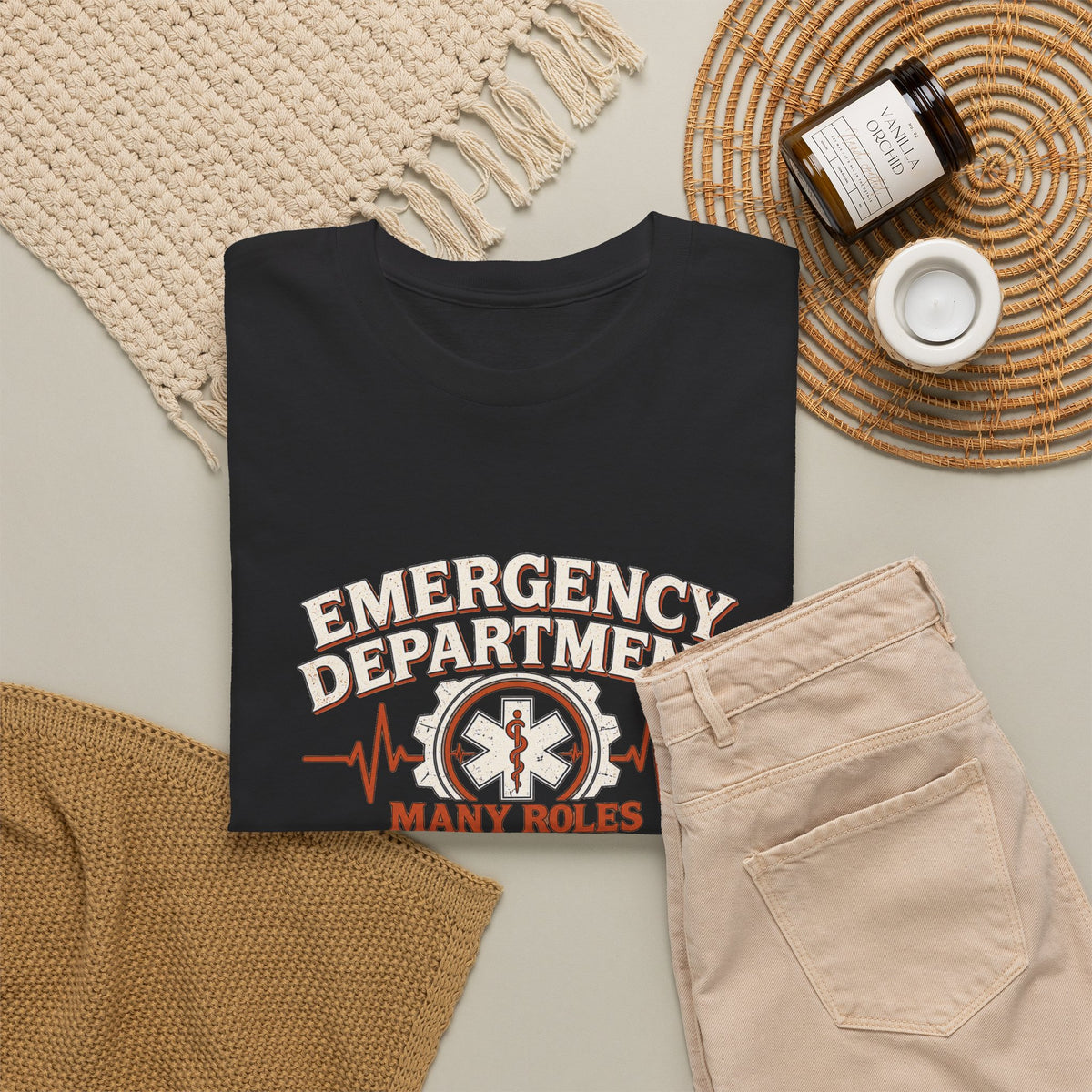 Hanging view of black Many Roles One Team emergency department unisex shirt
