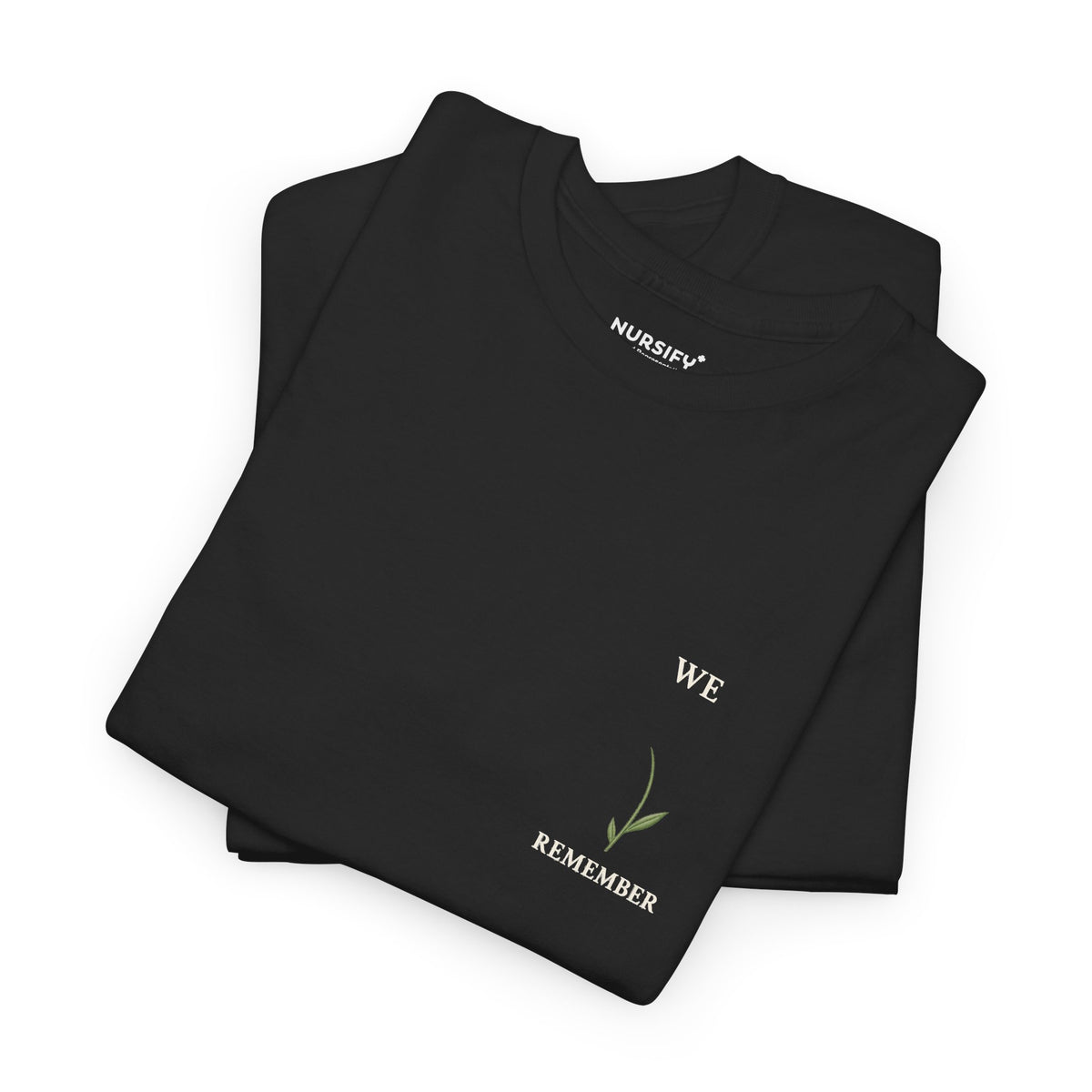 We Remember black Remembrance T-shirt with ivory lettering and a sage stem; space above the stem is for your own poppy pin.
