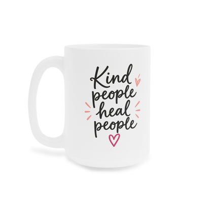 White 15oz ceramic mug with Kind People Heal People handwritten lettering and pink heart, opposite side view.