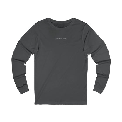Front view of a Asphalt Nursify Emergency Nurse script long sleeve shirt, showing the centred chest lettering.