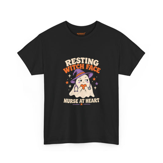 Front of black Resting Witch Face, Nurse at Heart Halloween T shirt with a ghost nurse wearing a purple witch hat and holding an orange heart.