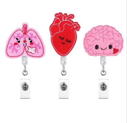 Cute Medical Badge Reels – Embroidered Nurse Badge Holder Collection | Heart, Brain, Lungs, Syringe, Uterus & More