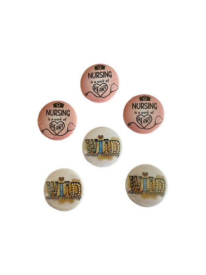 Pink Nursing Is a Work of Heart and white Wild About Nursing button pin designs