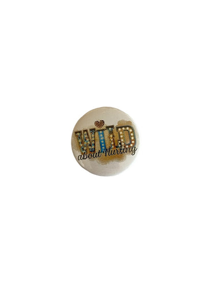 White Wild About Nursing button pin with animal-print lettering