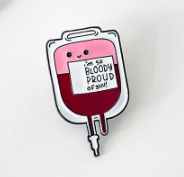 Smiling pink, red and white blood bag enamel pin for healthcare professionals