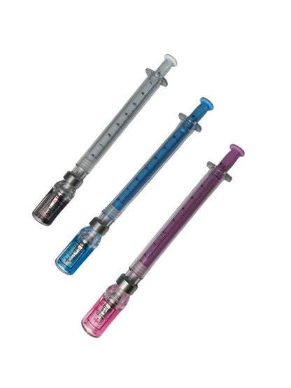 Vial and needle pen in pink, blue and black ink. 