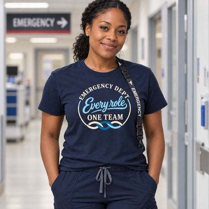 Nurse wearing navy Every Role One Team emergency department shirt and black Emergency lanyard