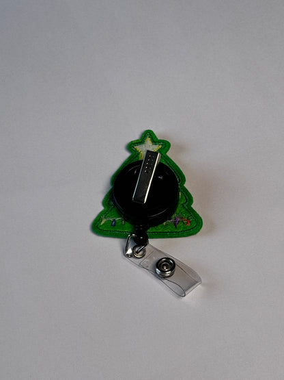 4. Christmas Tree. Actual Christmas Tree Badge Reel back