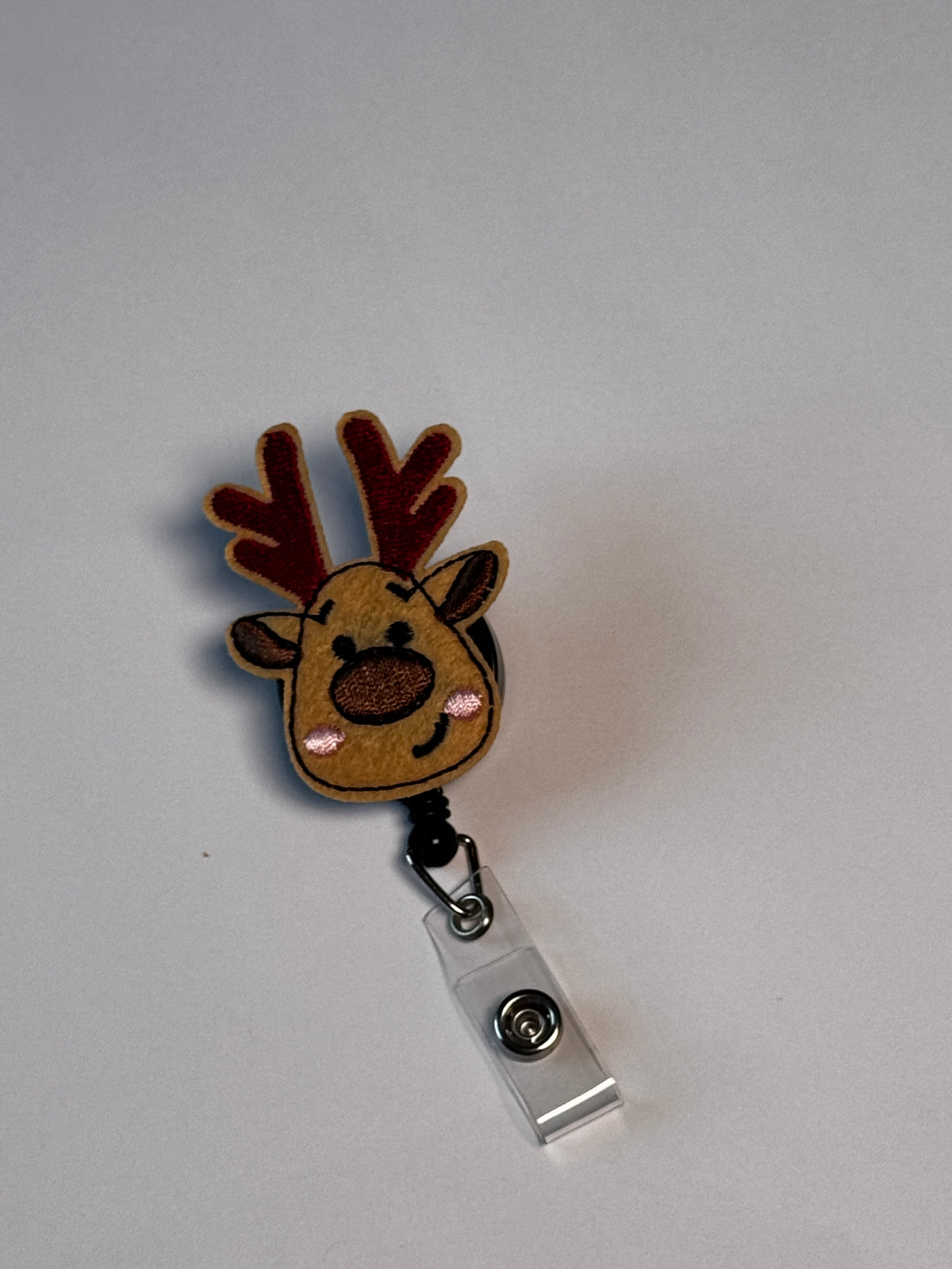 2. Reindeer. Actual Reindeer Christmas Badge Reel front