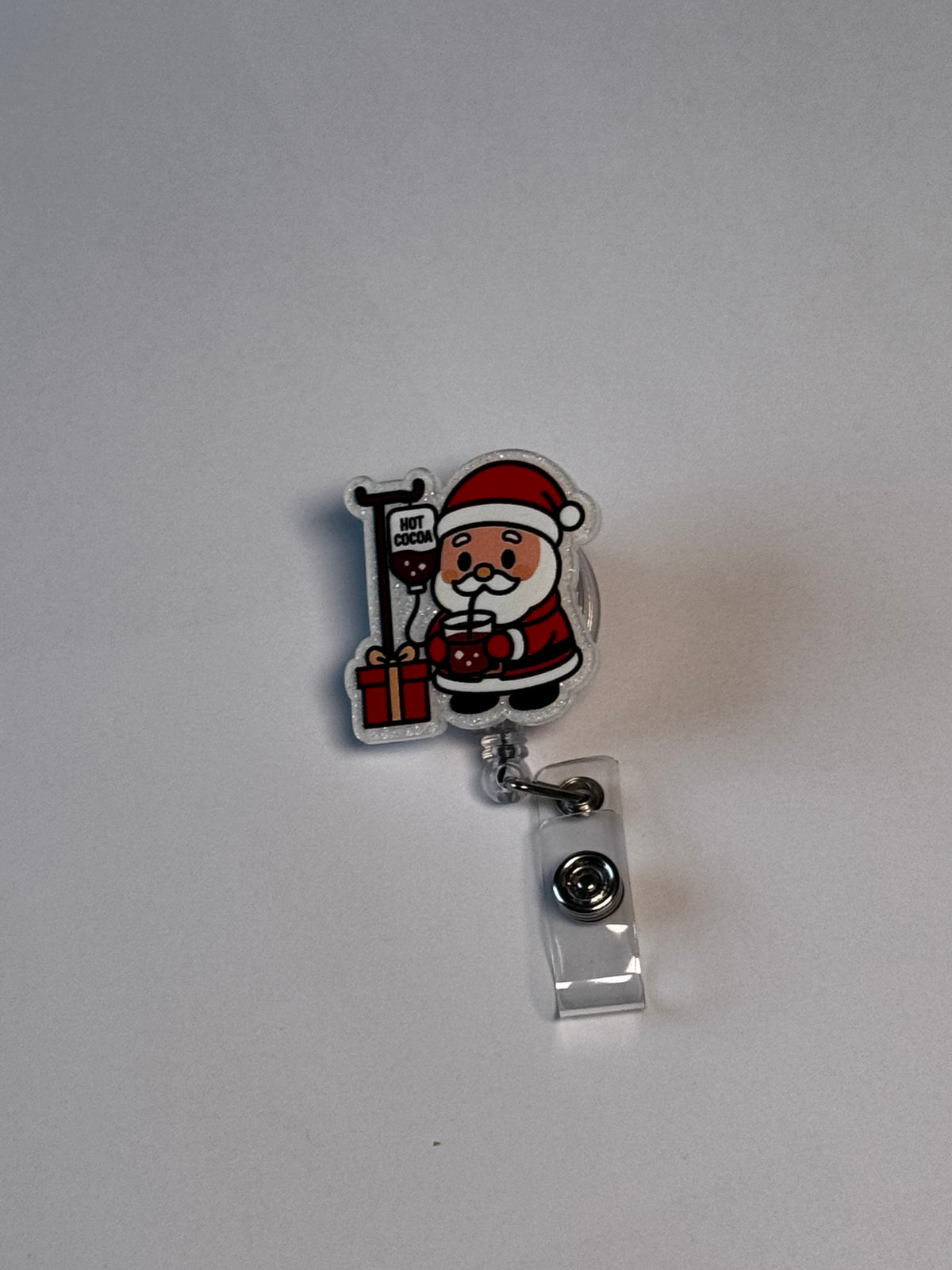 3. Santa with Cocoa IV. Actual Santa with IV Pole Christmas Badge Reel front