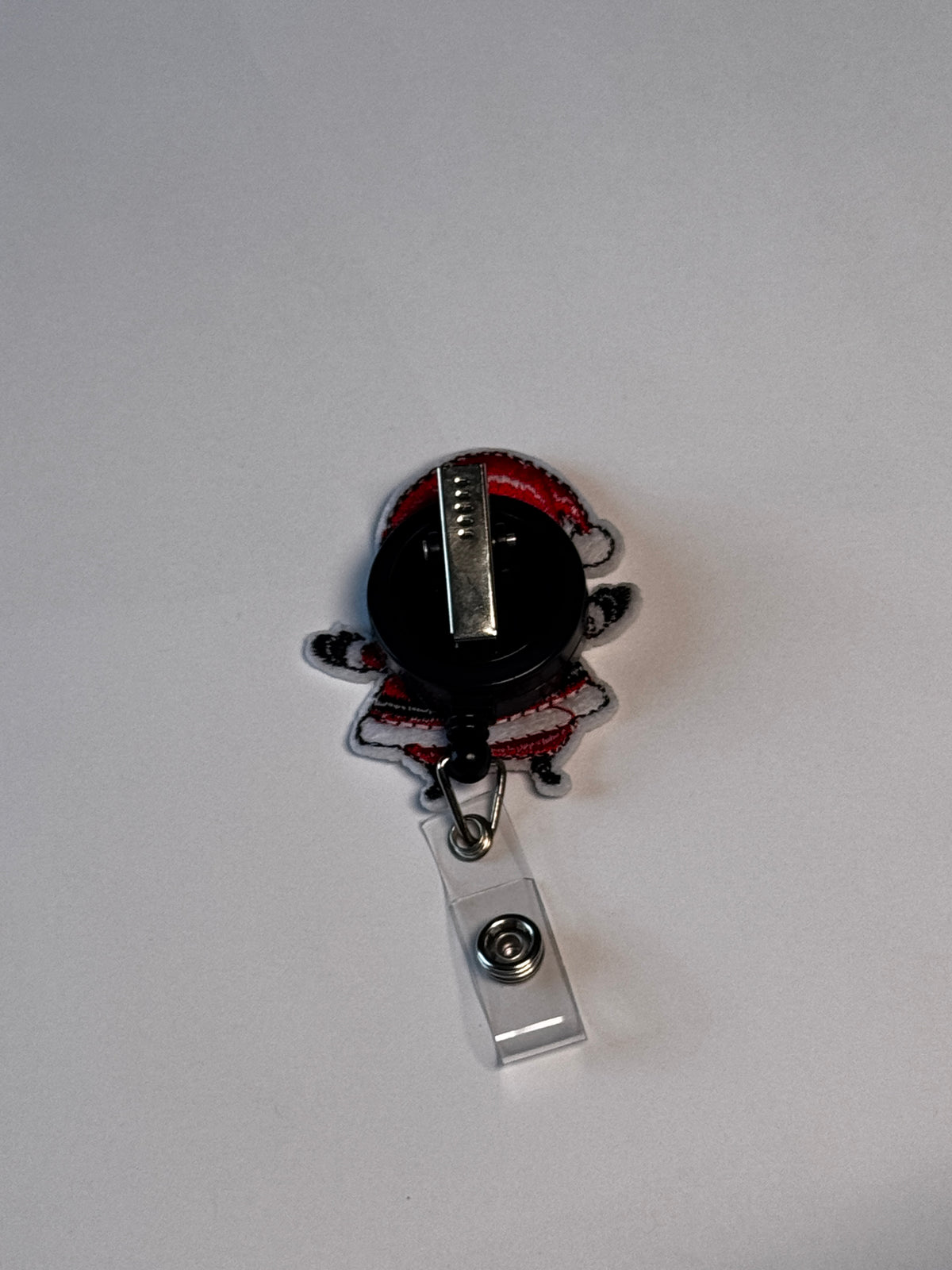 7. Santa. Actual Santa Christmas Badge Reel back