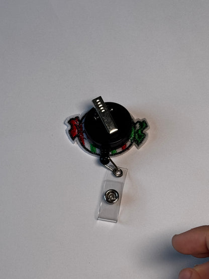 8. Striped Candy. Actual Striped Candy Christmas Badge Reel back