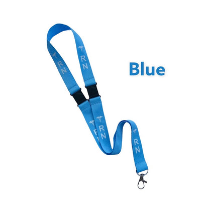 Light blue RN double-breakaway lanyard with white lettering and metal clasp