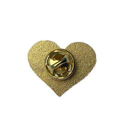 Back of heart-shaped Inclusion enamel pin showing the secure gold-tone closure