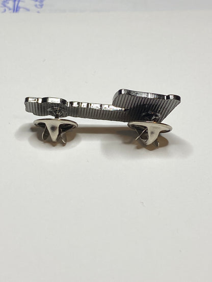 Back of Filipino RN enamel pin showing two secure pin posts and closures