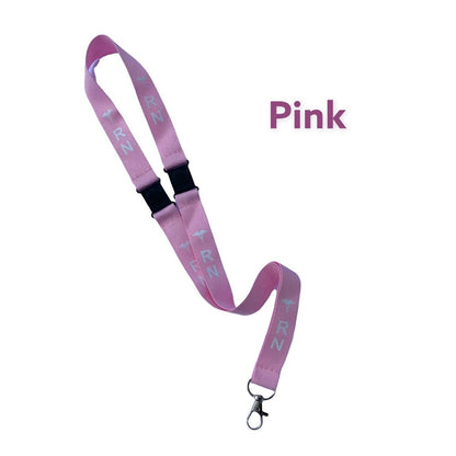 Light pink RN double-breakaway lanyard with white lettering and metal clasp